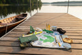 Collection of fishing-related items on a table with a map of Hayward, WI.